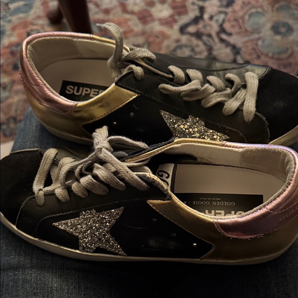 Golden Goose Black and Gold Sneakers with Pink Accents